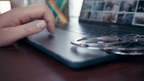 Man Working Laptop Handcuffs Desk Online Cyber Crime Concept — Stock Video