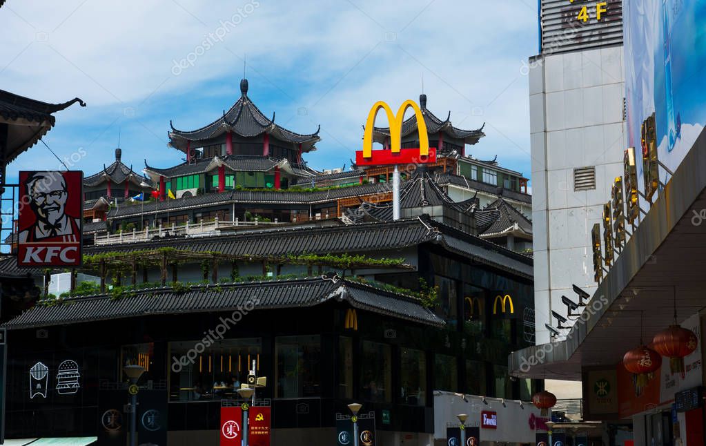 Shenzhen, China - July 16, 2018: McDonalds and KFC in China, Dong Men Pedestrian street in the old Shenzhen in traditional shaped building