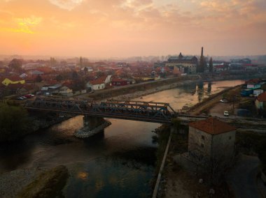 Old railway bridge and industrial zone in the city of Nis, Serbia clipart