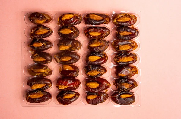 Fresh dates with almonds flat lay — Stock Photo, Image