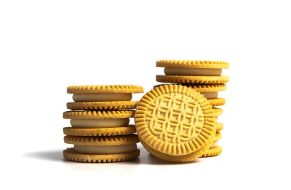 Golden biscuits isolated on white — Stock Photo, Image