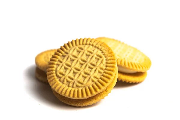 Golden biscuits isolated on white — Stock Photo, Image