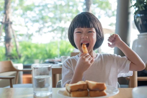 Kid eating food, happy time, breakfast