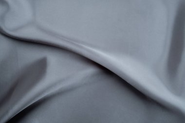 Gri kumaş dokusu arkaplanı, soyut, kumaşın yakın dokusu