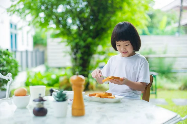 Kid eating food, happy time, breakfast
