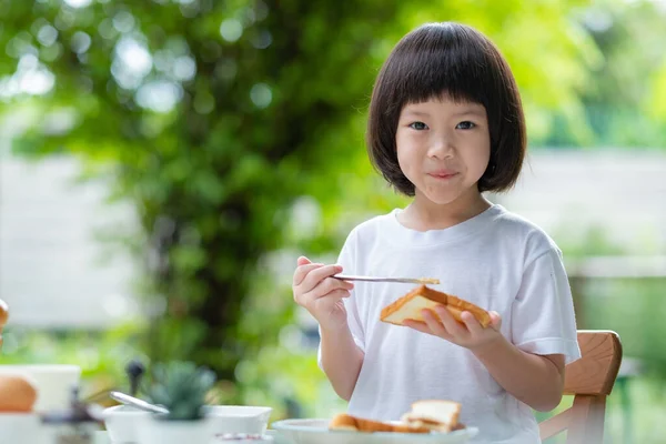 Kid eating food, happy time, breakfast