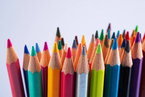 Colored pencils background, back to school concept