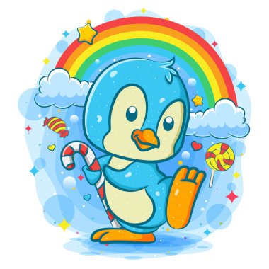 Şirin penguen çizim gökkuşağının altında şeker çubuğu tutuyor.