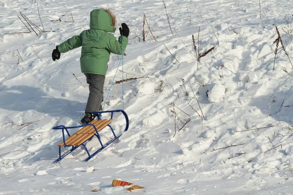 Child Pulling Sled Snowy Hill — Stock Photo, Image