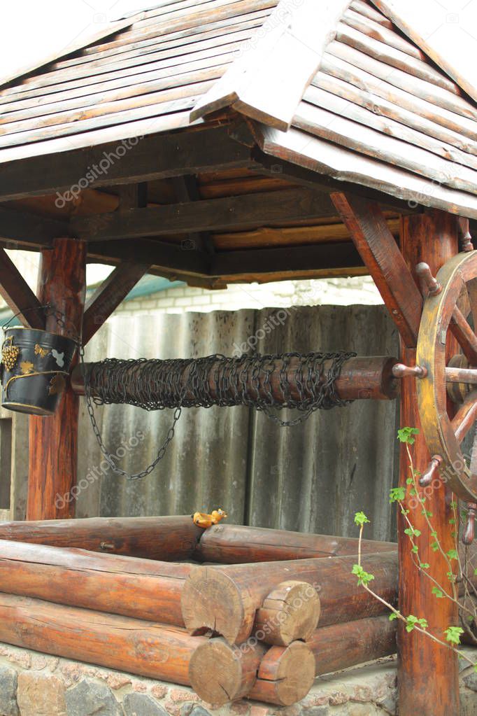 Close up of old wooden well