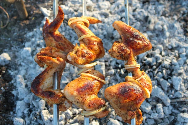 Cooking meat and sausages on the grill. — Stock Photo, Image