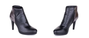 Klasik kadın deri ayak bileği çizmeler booties ayakkabı çifti. İki izole.