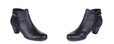 Klasik kadın deri ayak bileği çizmeler booties ayakkabı çifti. İki izole.