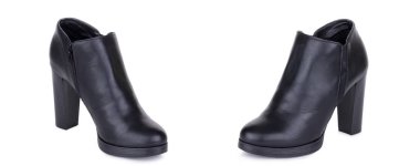 Klasik kadın deri ayak bileği çizmeler booties ayakkabı çifti. İki izole.