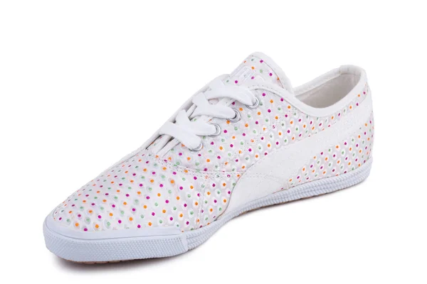 One white dotted pattern fiber fabric casual sneakers shoe isolated white background — 图库照片