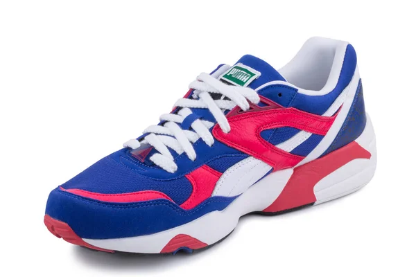 One colorful blue, white, red leather and fabric casual ankle sneakers shoe isolated white background