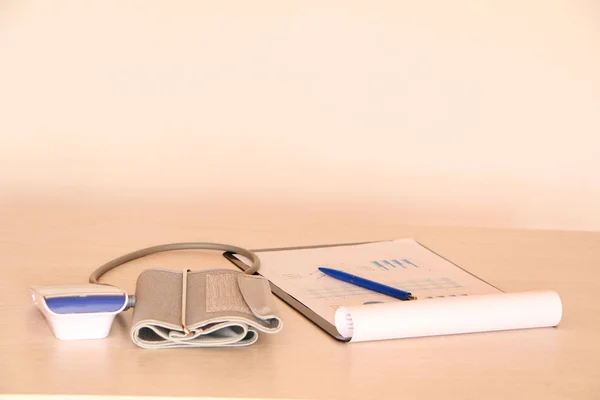 Close-up - doctor measures blood pressure