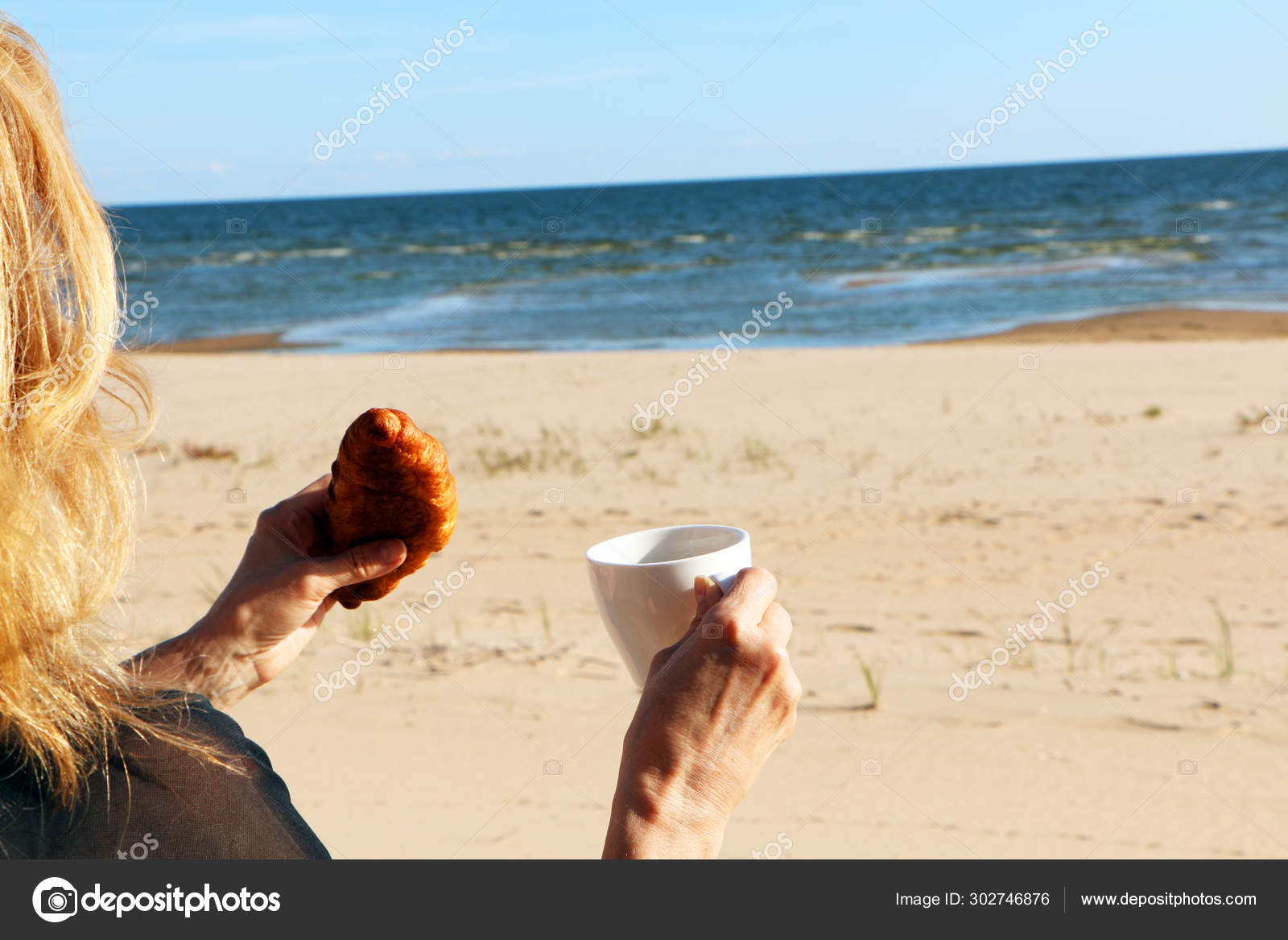 Girl With A Croissant And A Cup Of Coffee By The Sea Stock Photo Image By C Toberto