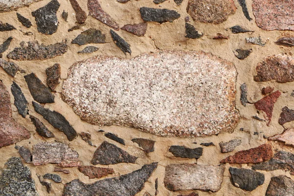 Gamla historiska granit stenmur. — Stockfoto