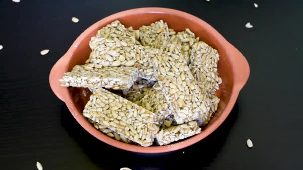 Dessert Made Sunflower Seeds Delicious Lying Clay Dish Sprinkled Top — Stock Video