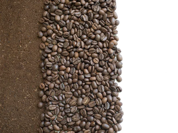 Ground and grain with free white space for lettering. Card with brown background of the ground coffee beans. Earth, tobacco brown flakes