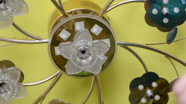 Man Unscrews Ceiling Light Chandelier Special Key Yellow Stretch