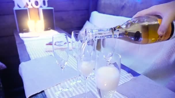 Champagne Hand Pouring Champagne Glasses — Stock Video