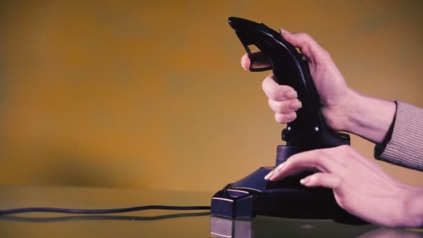 Girl Plays Computer Games Joystick Yellow Background — Stock Video