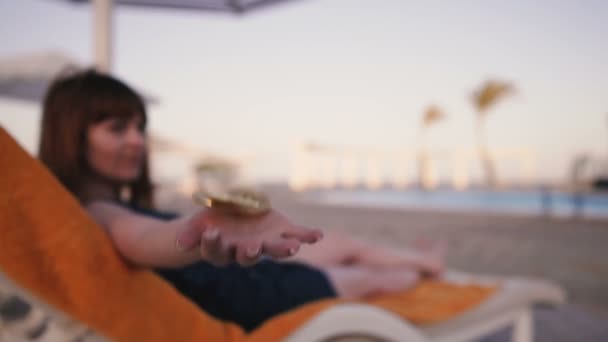 Bitcoin Girl Lying Beach Lounger Showing Bitcoin Coin Background Pool — Stock Video