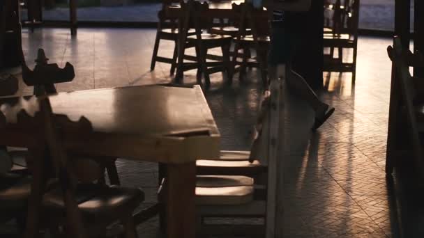 Bar Tables Illuminating Sunset Background Silhouette Man — Stock Video