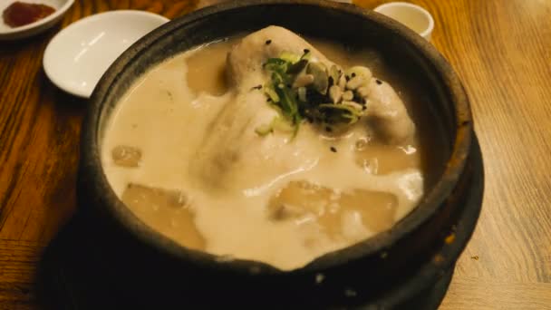 Chicken soup. Korean dish Samgyetang — Stock Footage Chicken Soup Korean Dish Samgyetang Video Clip