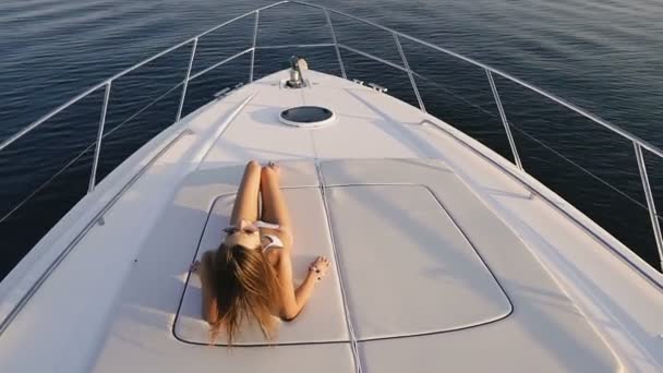 Yacht Girl Swimsuit Sunbathes Deck Yacht — Stock Video