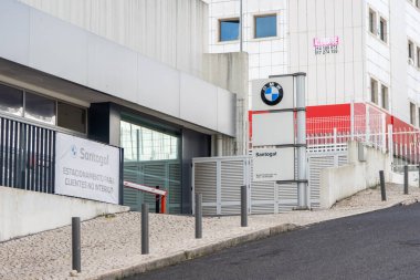 Santogal bmw dealership and service center entrance in carnaxide, lisbon, portugal, showcasing the brand's logo and modern architecture