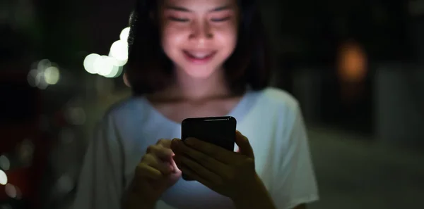 Closeup Woman Holding Smartphone Night Street Technology Communication Concept — Stock Photo, Image