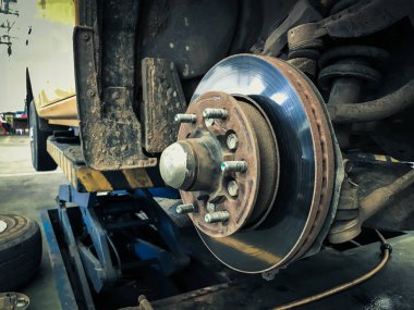 Brake discs and wheel axles heck repair. clipart