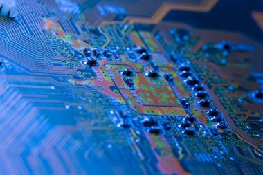 Elektronik devre kartı arka planı, yakın plan fotoğrafı.