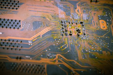 Elektronik devre kartı arka planı, yakın plan fotoğrafı.