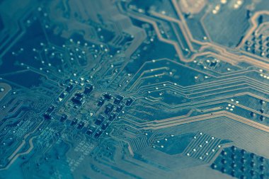 Elektronik devre kartı arka planı, yakın plan fotoğrafı.