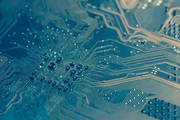 Elektronik devre kartı arka planı, yakın plan fotoğrafı.