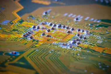 Elektronik devre kartı arka planı, yakın plan fotoğrafı.
