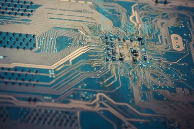 Elektronik devre kartı arka planı, yakın plan fotoğrafı.