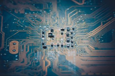 Elektronik devre kartı arka planı, yakın plan fotoğrafı.