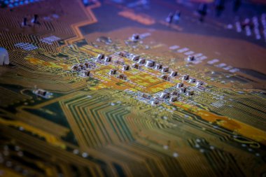 Elektronik devre kartı arka planı, yakın plan fotoğrafı.