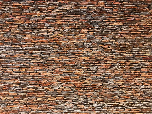 Dinding Bata Horisontal Tinggi Dihadapi Dengan Batu Tulis Halus Salin Stok Gambar