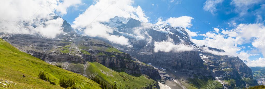 Panoram View of the famous peak Jungfrau and Monch, under the north face, on Bernese Oberland in Switzerland.