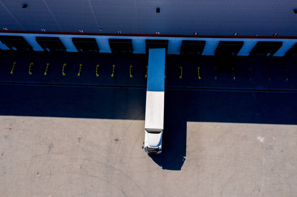 Distribution logistics building parking lot. Aerial View