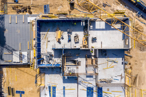 Construction site and equipment - aerial view. Residential Building