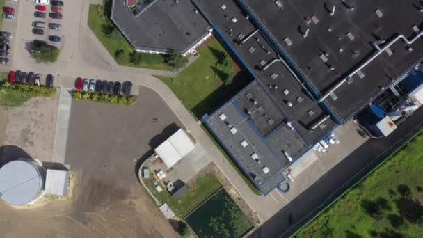 Aerial view of the logistics warehouse with trucks waiting for loading — Stock Video