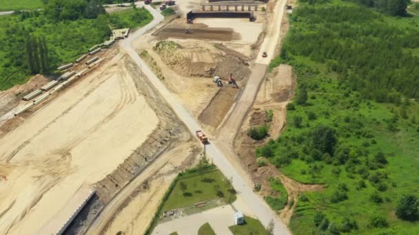 Aerial view on the new road construction site. Highway — Stock Video