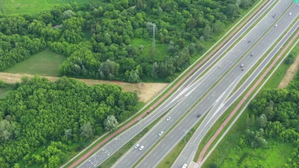 Aerial view of highway junction with traffic i — Stock Video